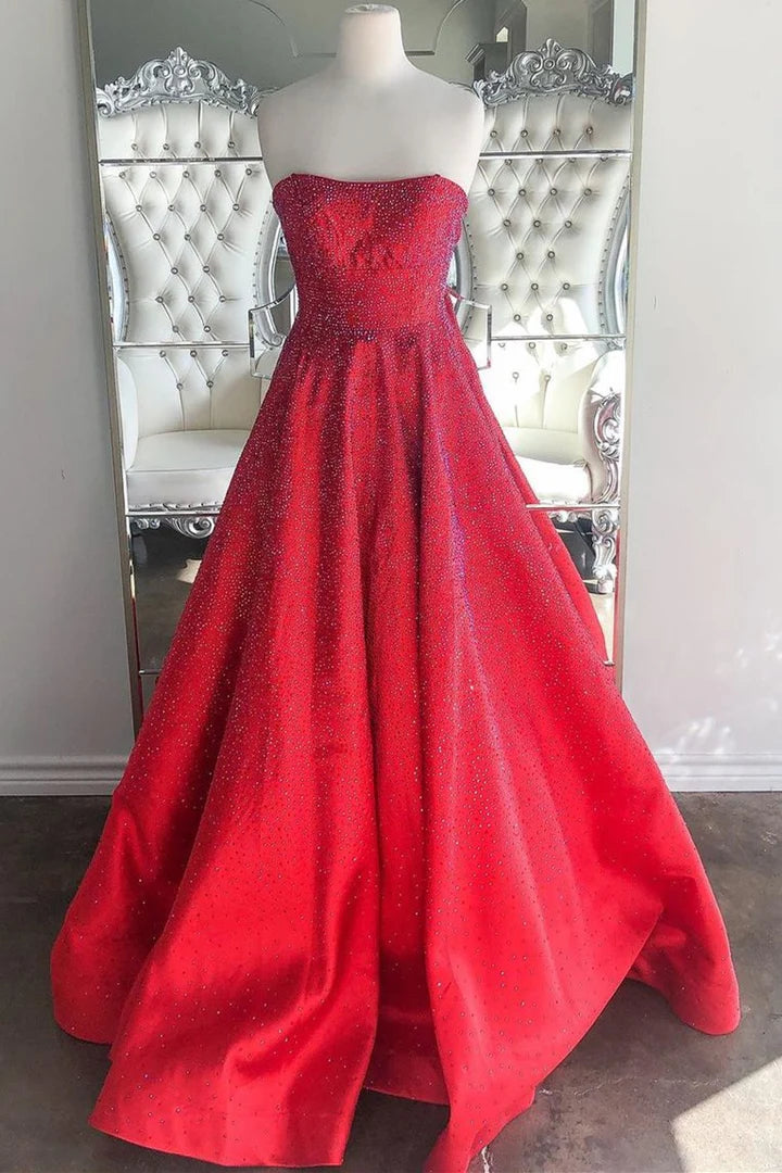 Vestido de fiesta sin tirantes, corte A y largo hasta el suelo con hombros descubiertos
